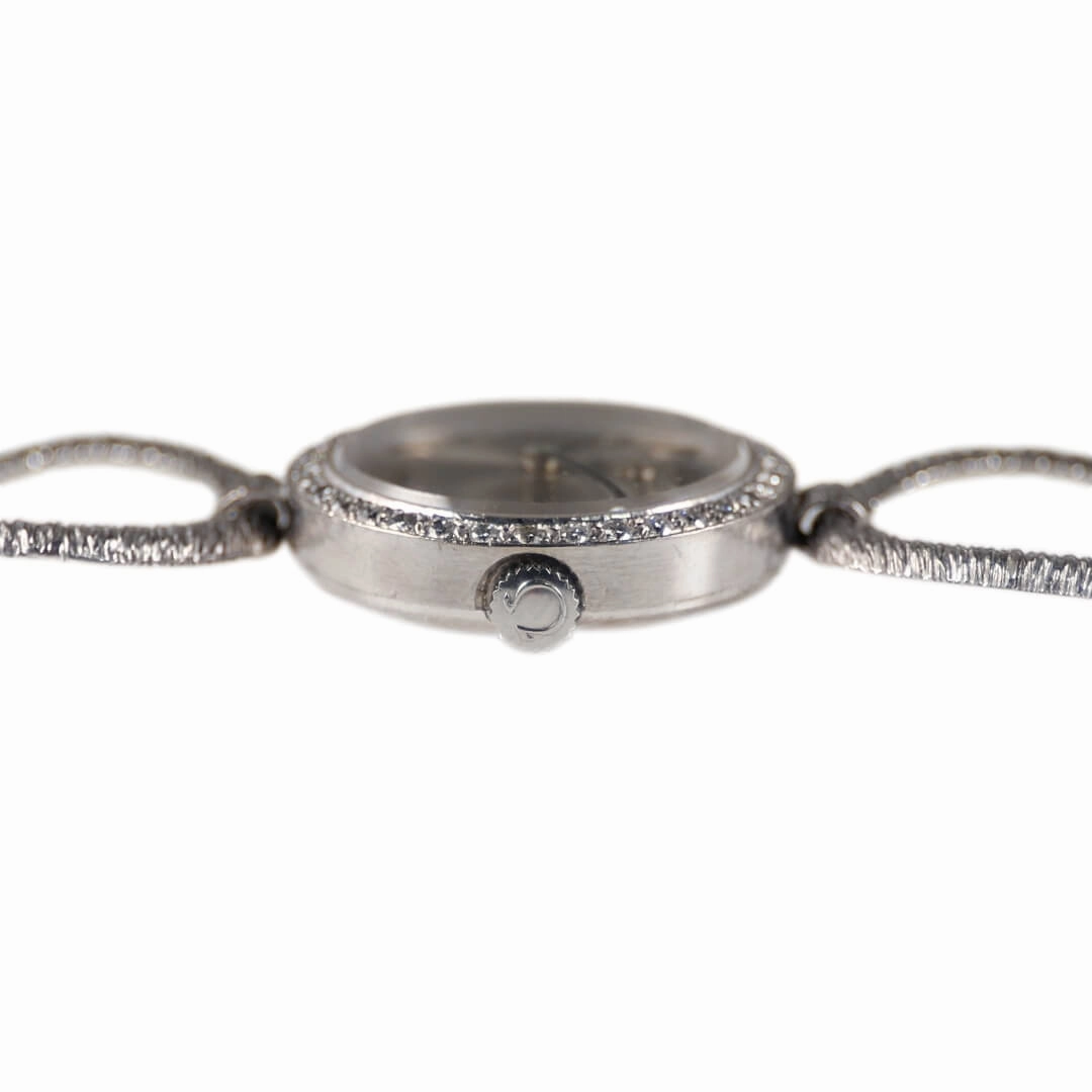 Omega 18k white gold cocktail watch with diamond bezel, 1964