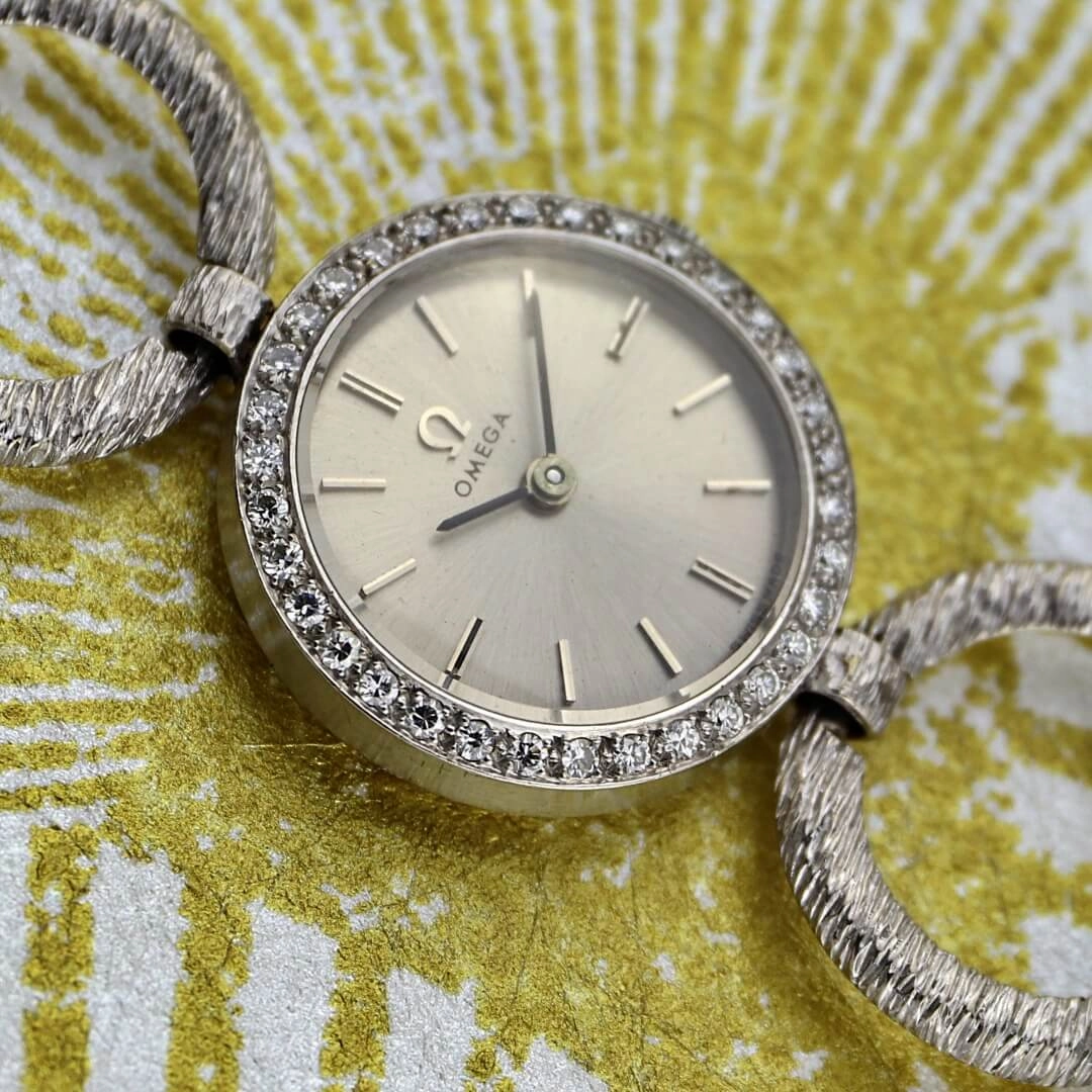 Omega 18k white gold cocktail watch with diamond bezel, 1964