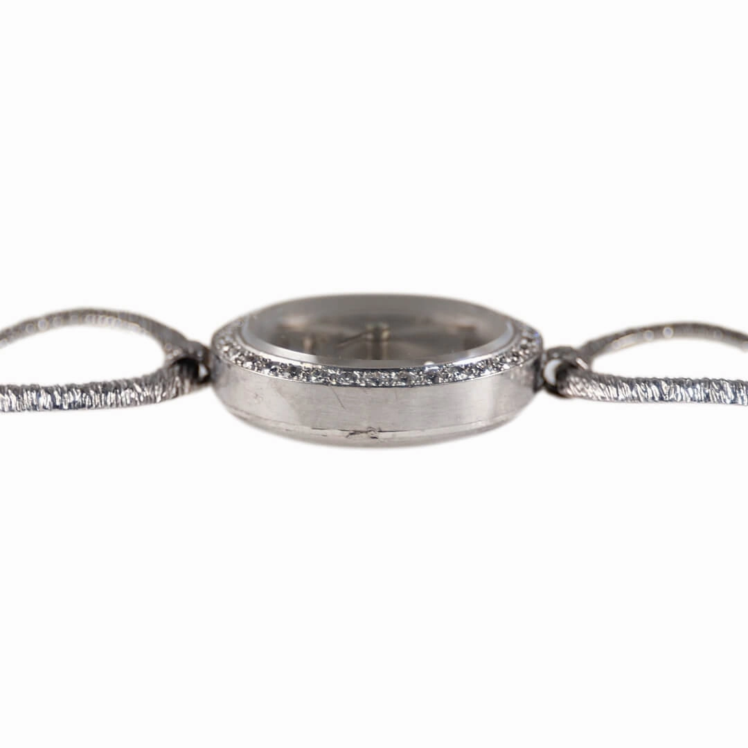 Omega 18k white gold cocktail watch with diamond bezel, 1964