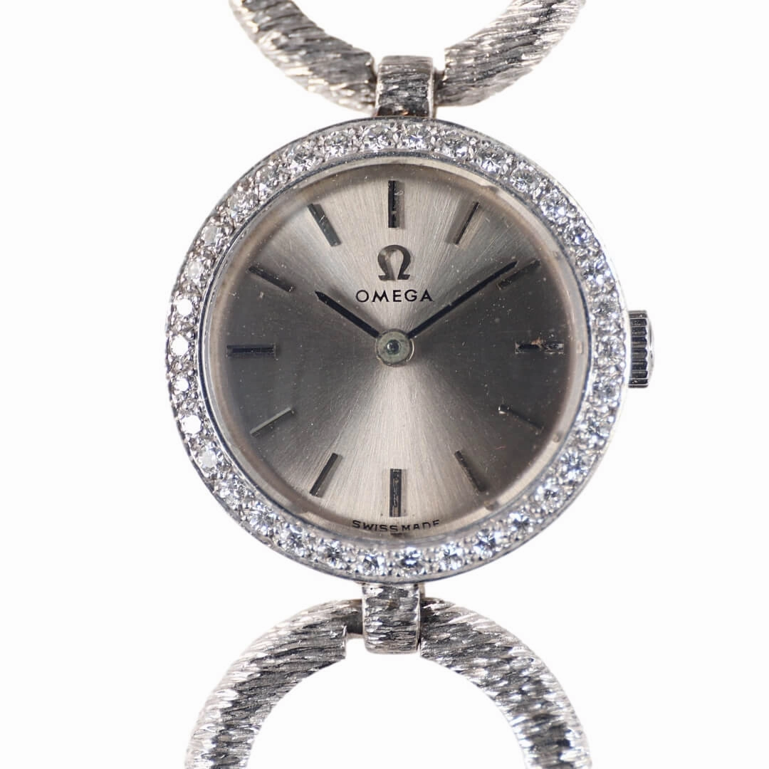 Omega 18k white gold cocktail watch with diamond bezel, 1964