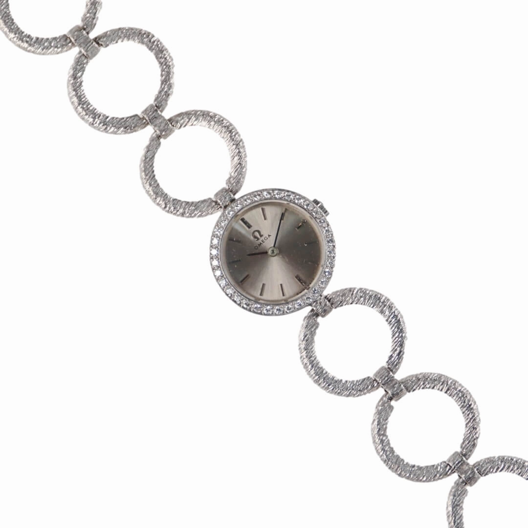 Omega 18k white gold cocktail watch with diamond bezel, 1964