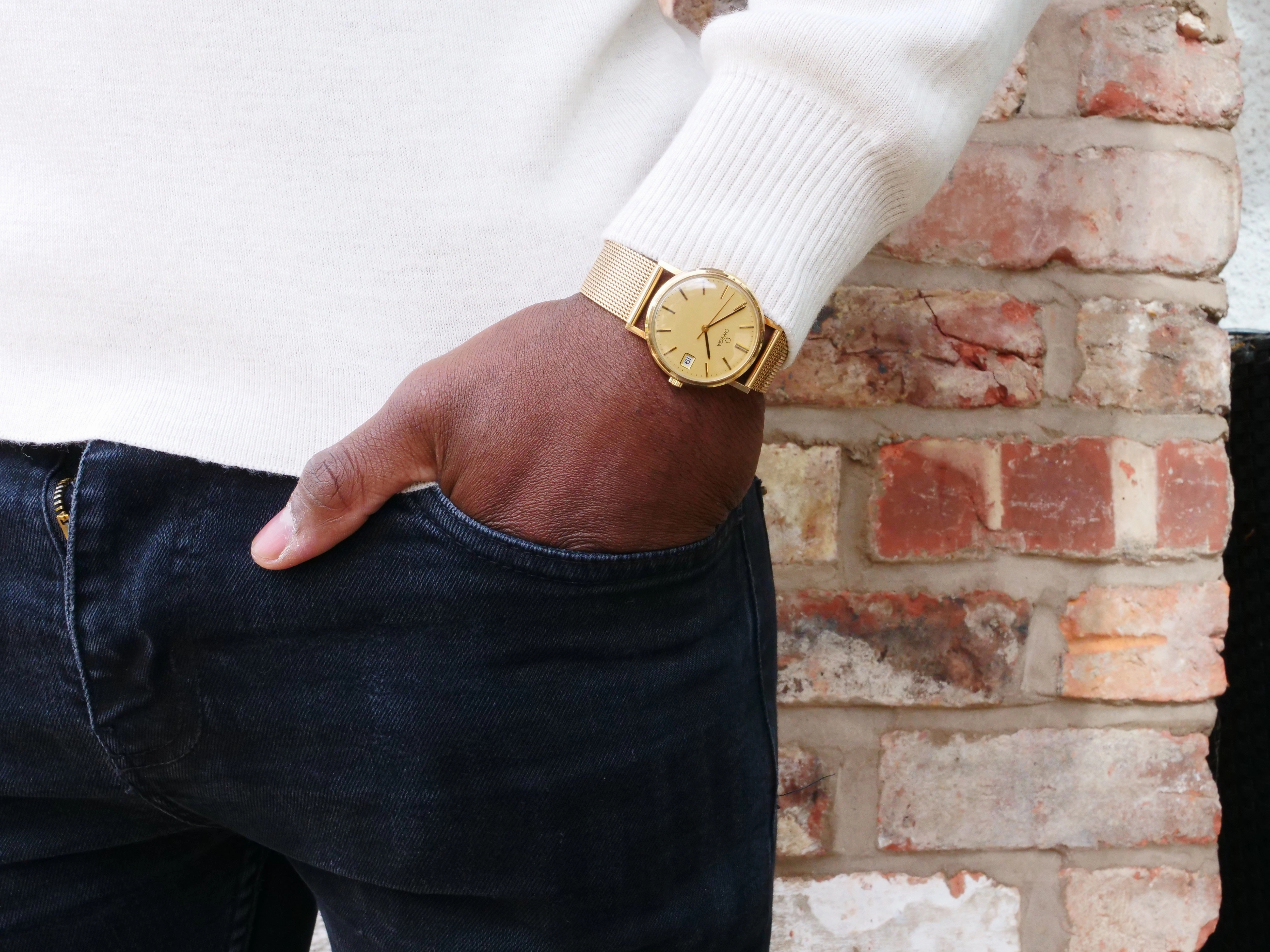 Omega 9 ct gold gents dress watch.