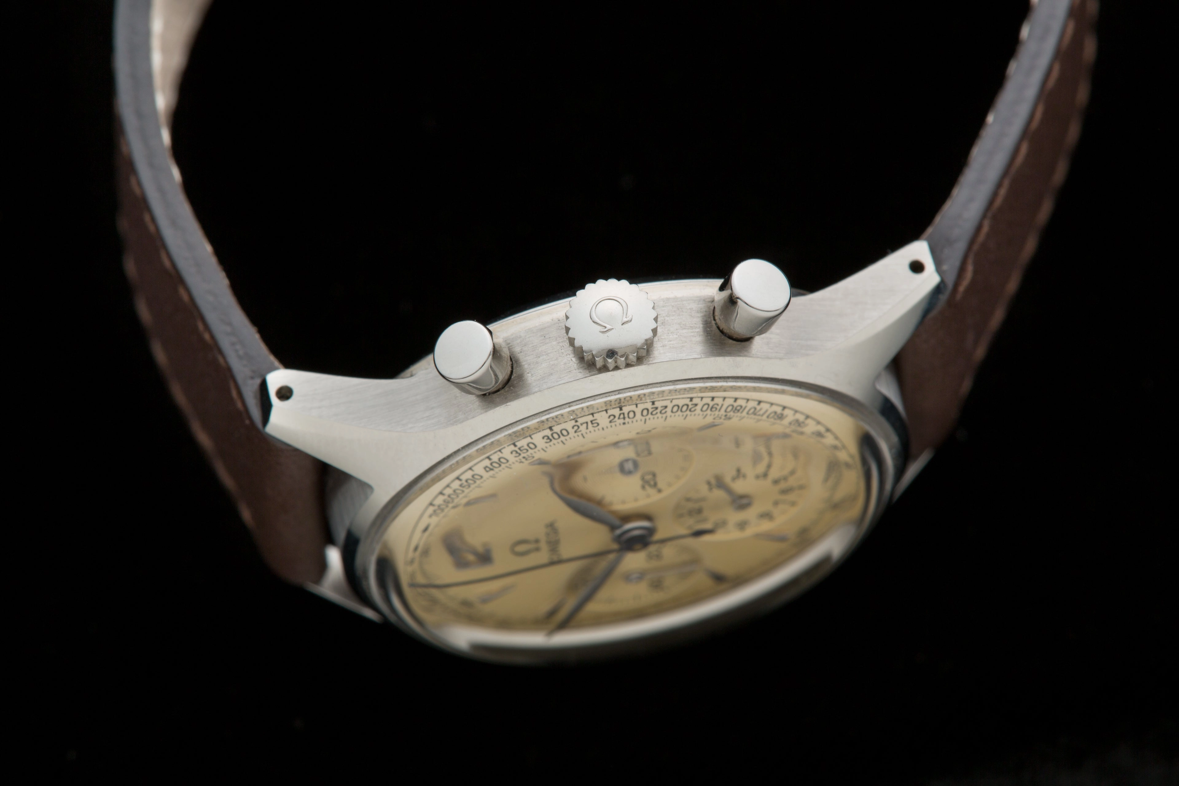Omega chronograph Ref 2451 with extract from the archives