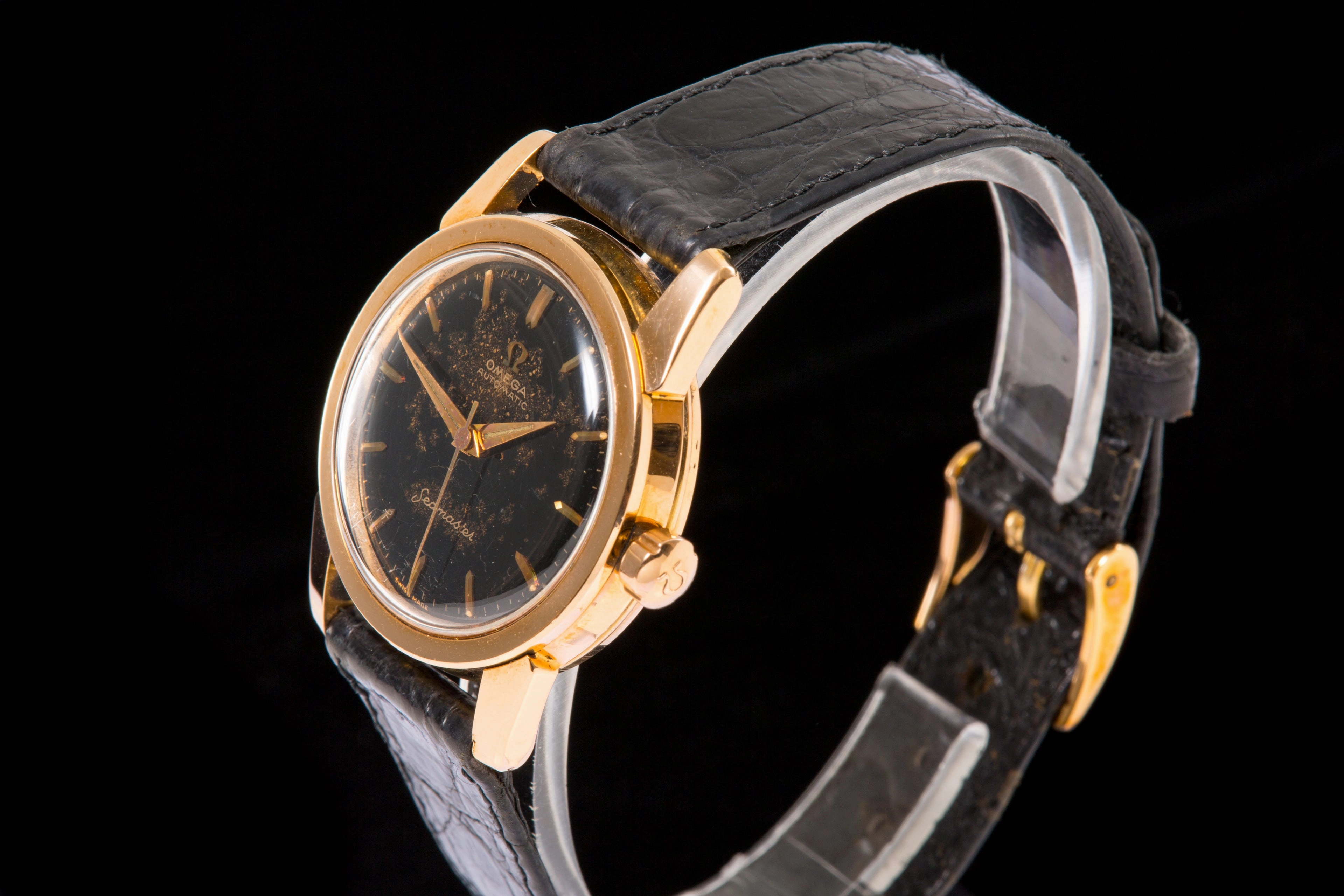 Omega Seamaster Rose gold with black gilt starburst dial