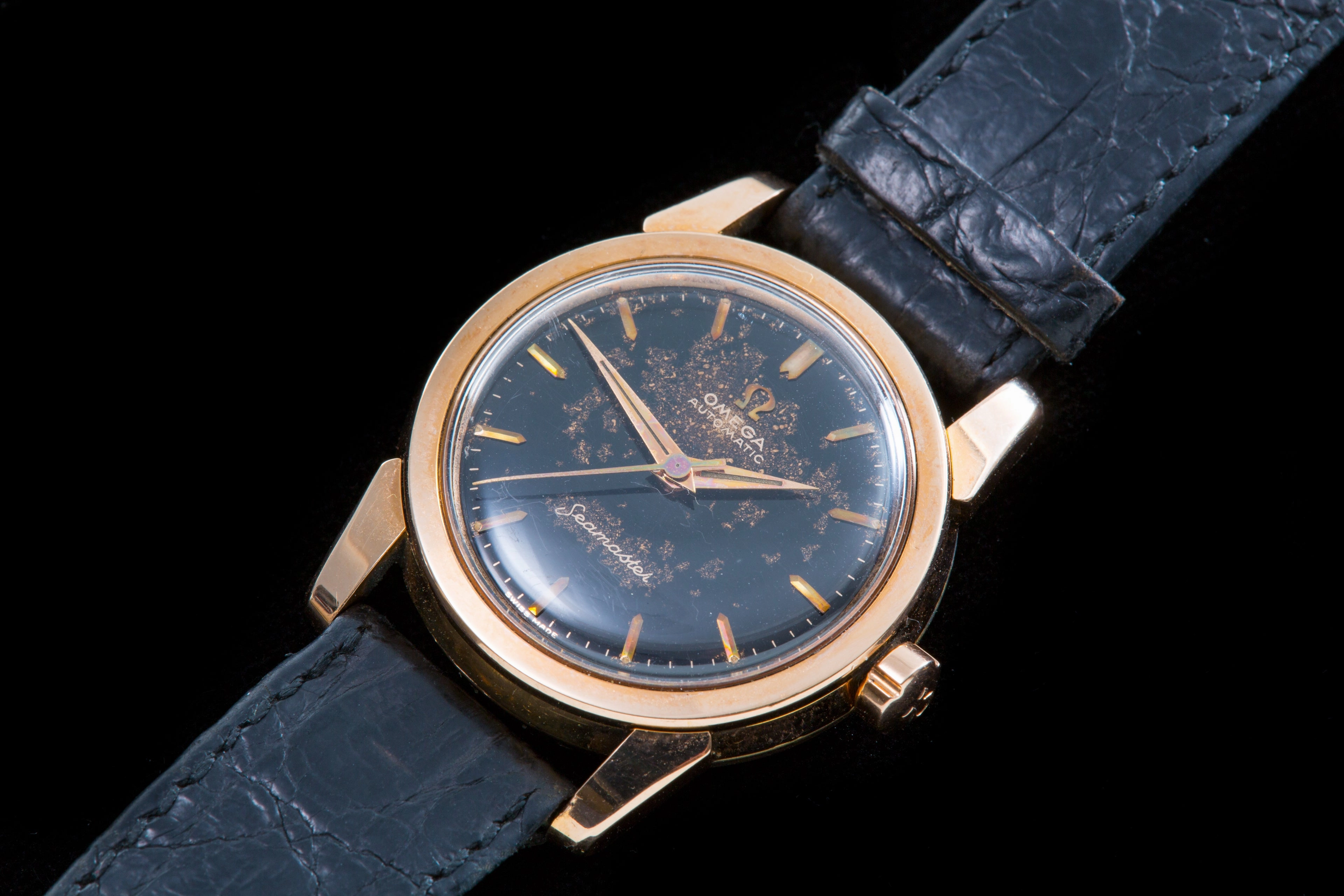 Omega Seamaster Rose gold with black gilt starburst dial