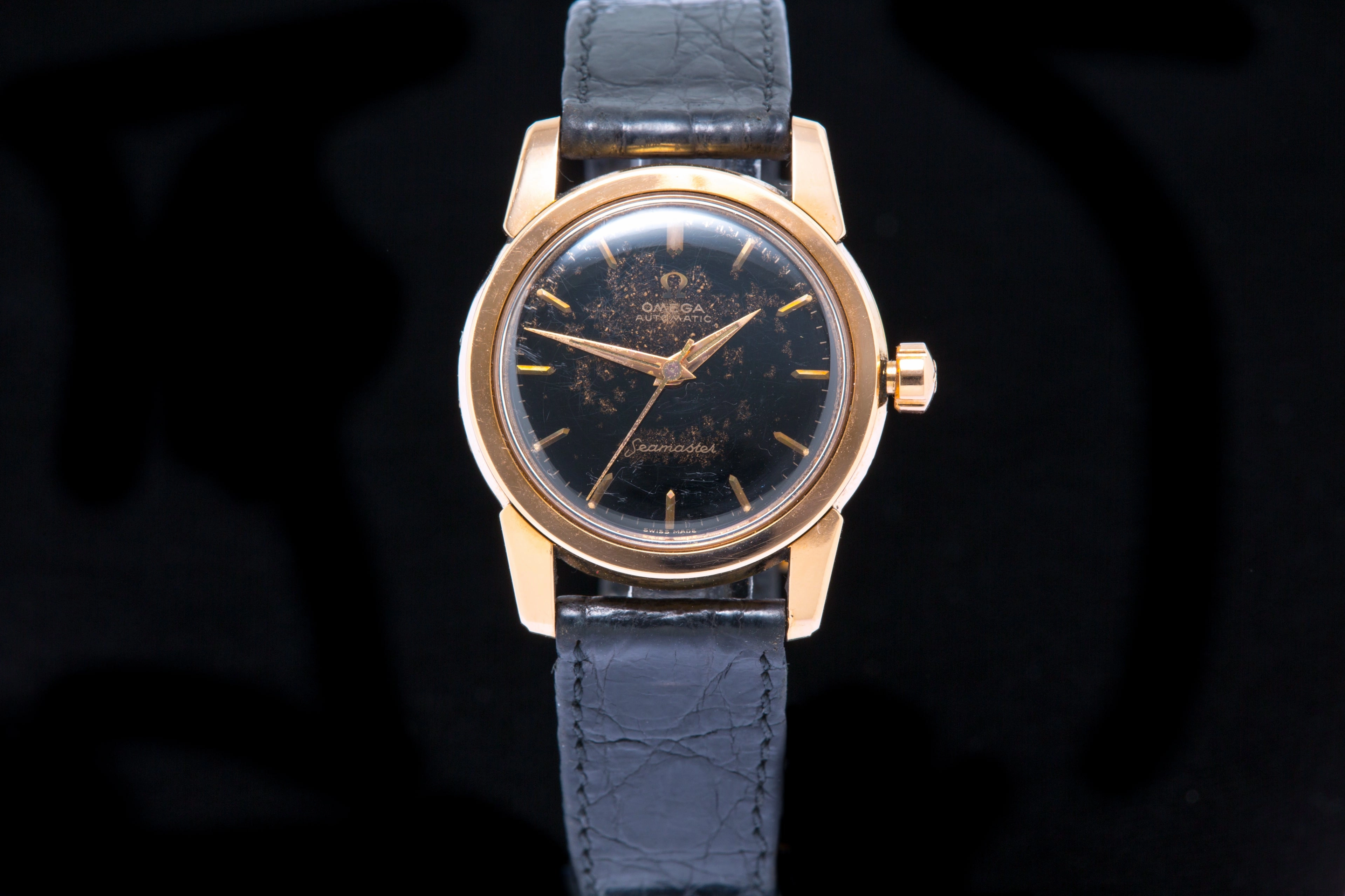 Omega Seamaster Rose gold with black gilt starburst dial