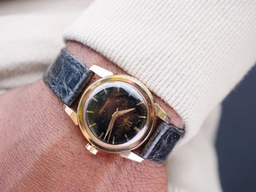 Omega Seamaster Rose gold with black gilt starburst dial